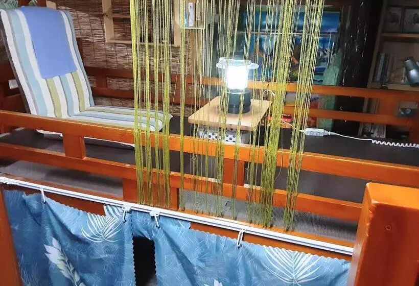 Retkeilymaja Amami Guest House Showaso