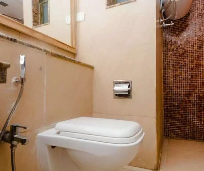 ホテル Capital O 35403 Discover Resorts