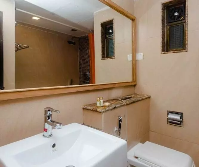 ホテル Capital O 35403 Discover Resorts
