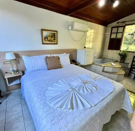 ホテル Pousada E Chalés Arco íris