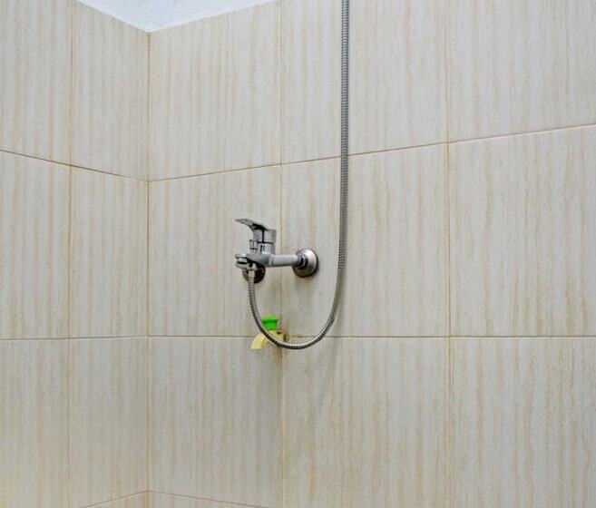 בית מלון כפרי Oyo 90029 Bwi Guest House