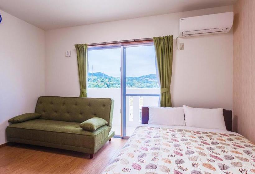 Отель Kariyushi Condominium Resort Kin Yaka Seaside