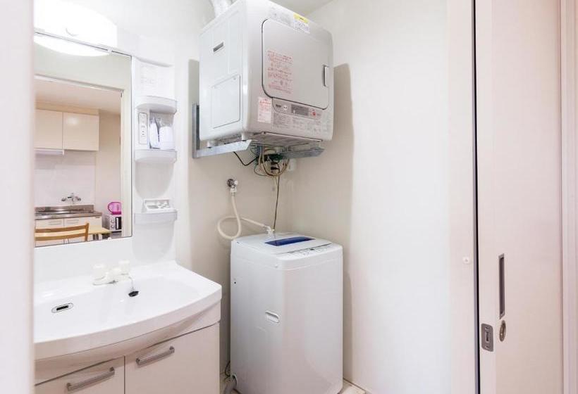 Отель Kariyushi Condominium Resort Kin Yaka Seaside