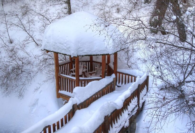 Log Cabin On The Stream