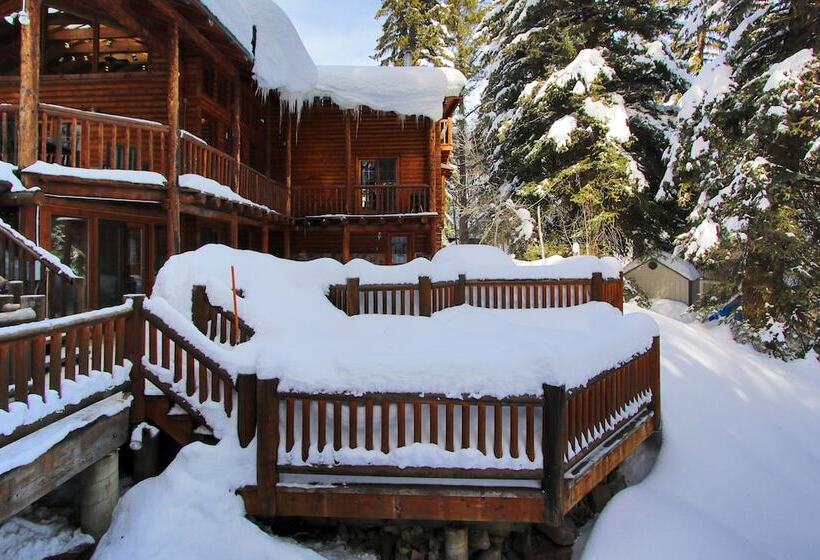 Log Cabin On The Stream