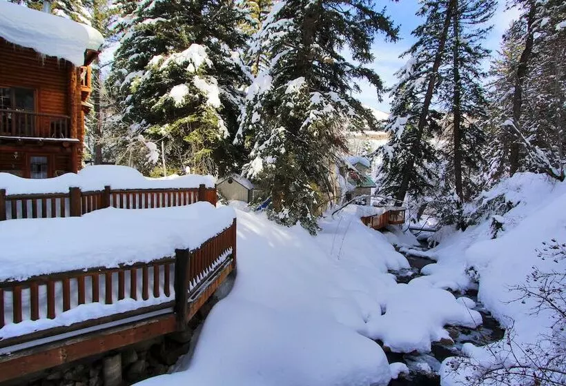 Log Cabin On The Stream
