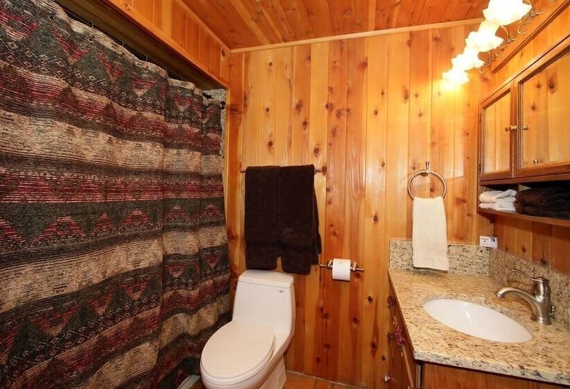 Log Cabin On The Stream