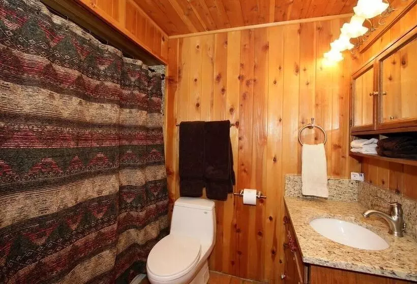 Log Cabin On The Stream