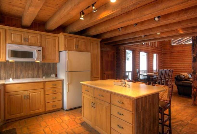 Log Cabin On The Stream