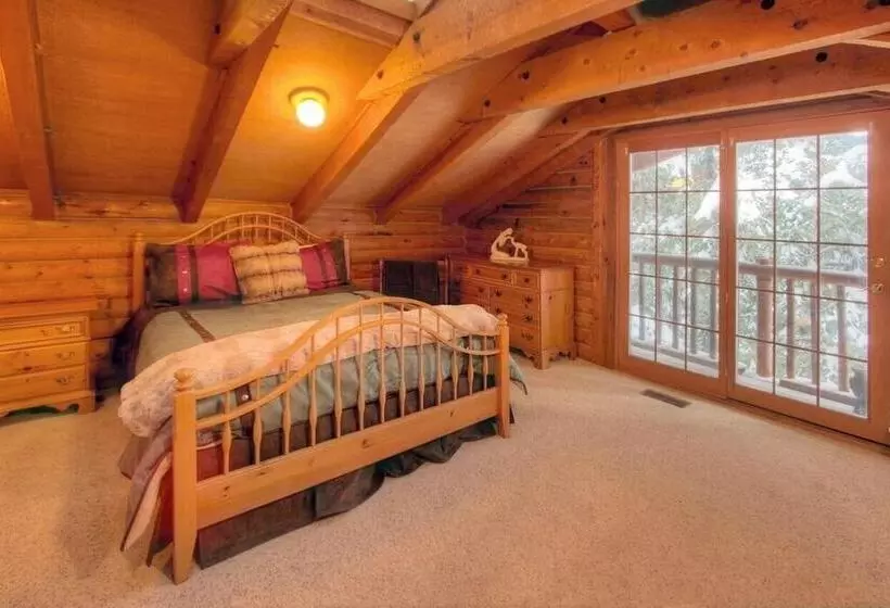 Log Cabin On The Stream