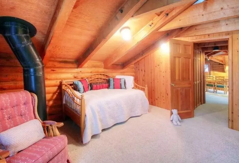 Log Cabin On The Stream