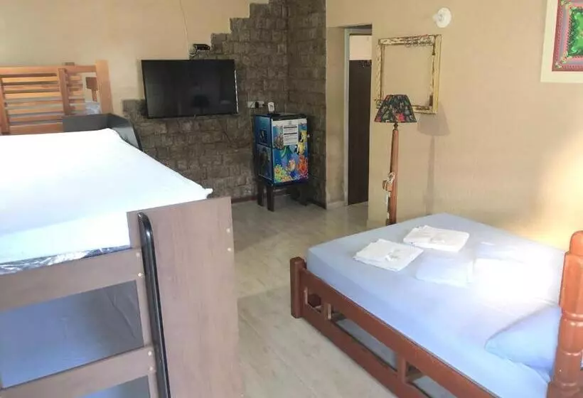 ペンション O Mar Hospedagem   Suítes Privadas