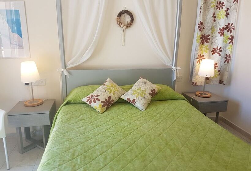 Natura Beach Hotel And Villas