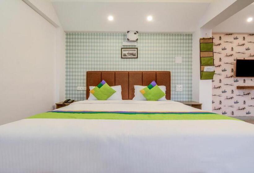 בית מלון כפרי Treebo Iris Suites