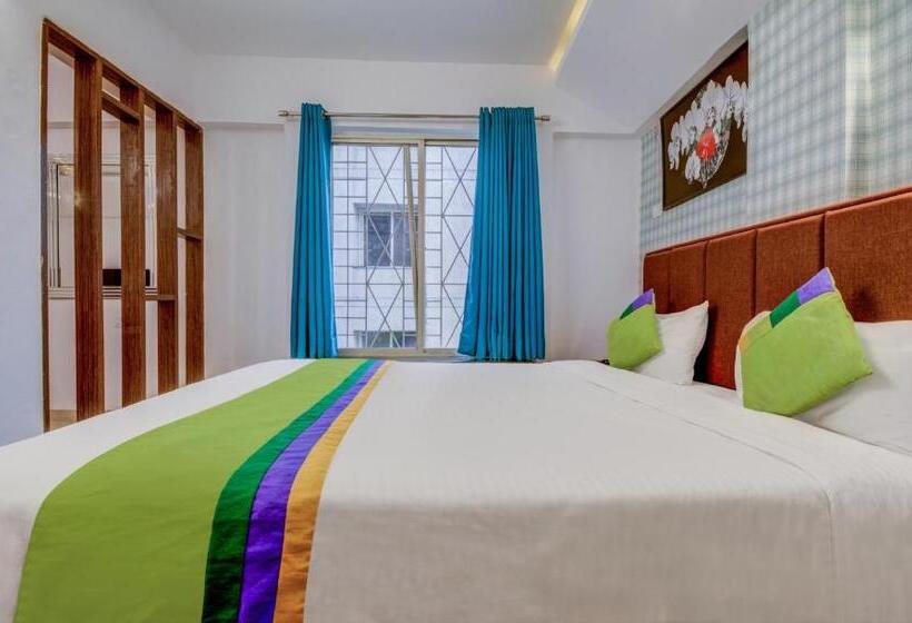 בית מלון כפרי Treebo Iris Suites