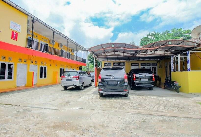 Отель Oyo 90216 Kost Sanny