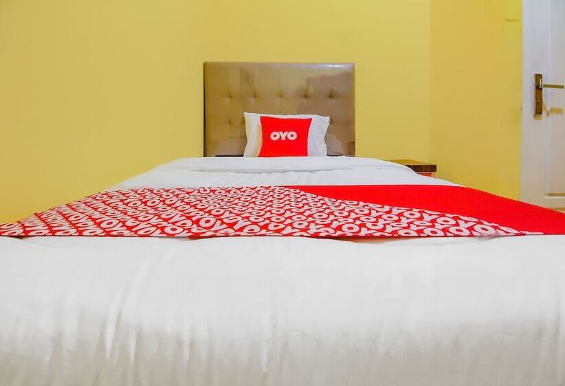 Отель Oyo 90216 Kost Sanny