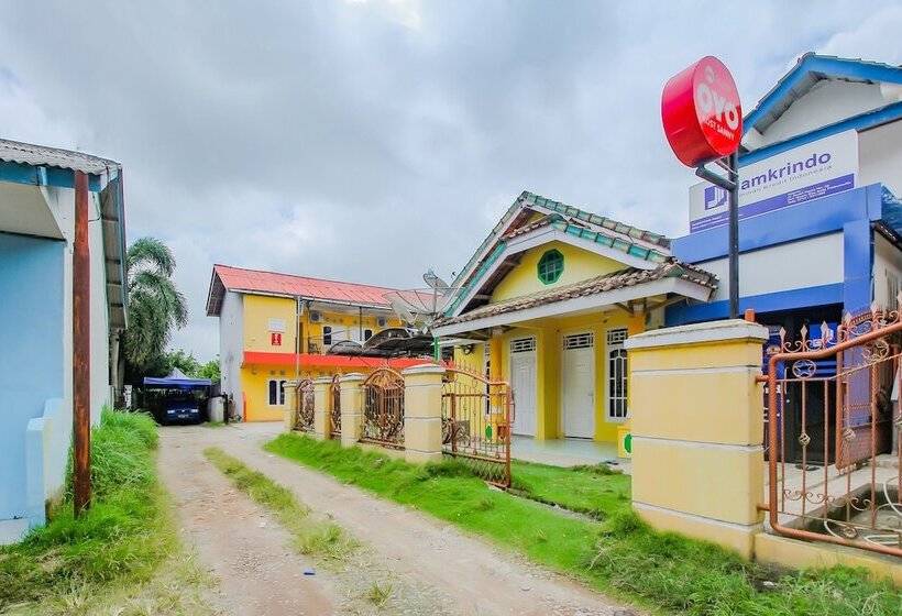 Отель Oyo 90216 Kost Sanny