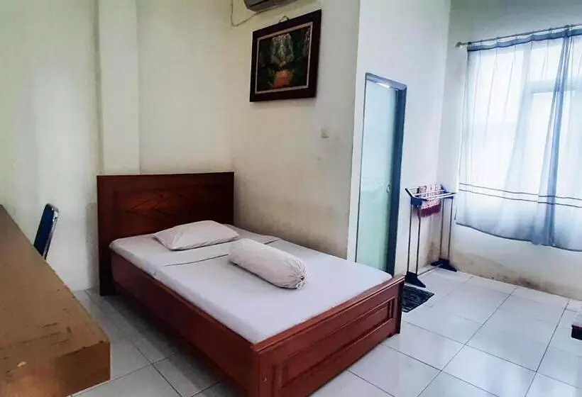 Hotelli Reddoorz Syariah At Penginapan Sederhana Palembang