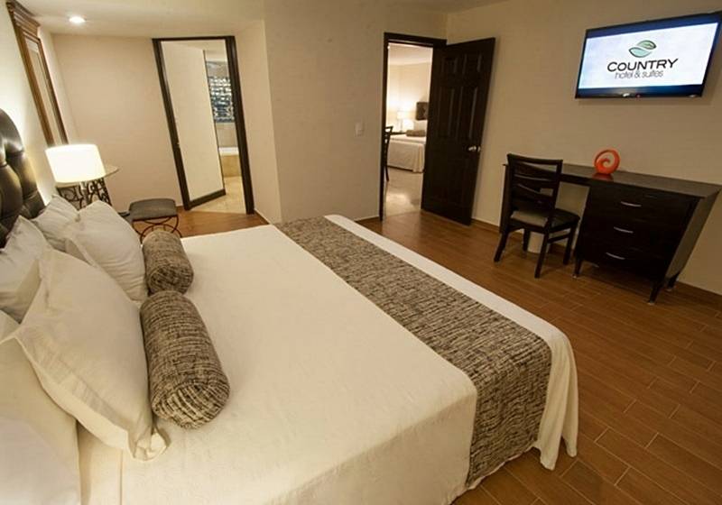 Country Hotel & Suites