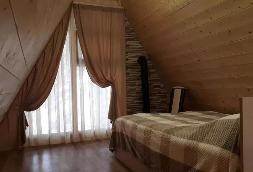 هتل Woodland Cottages