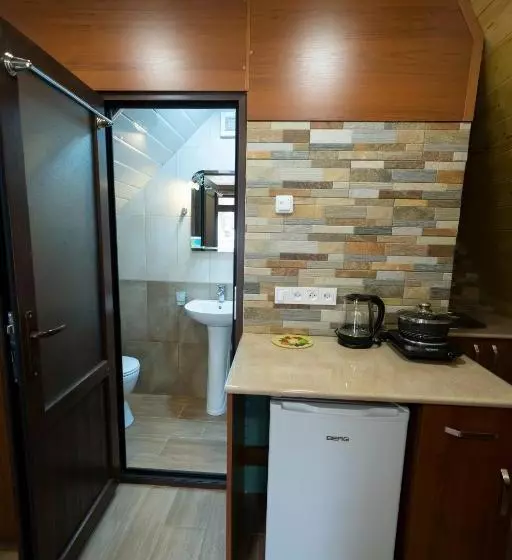 هتل Woodland Cottages