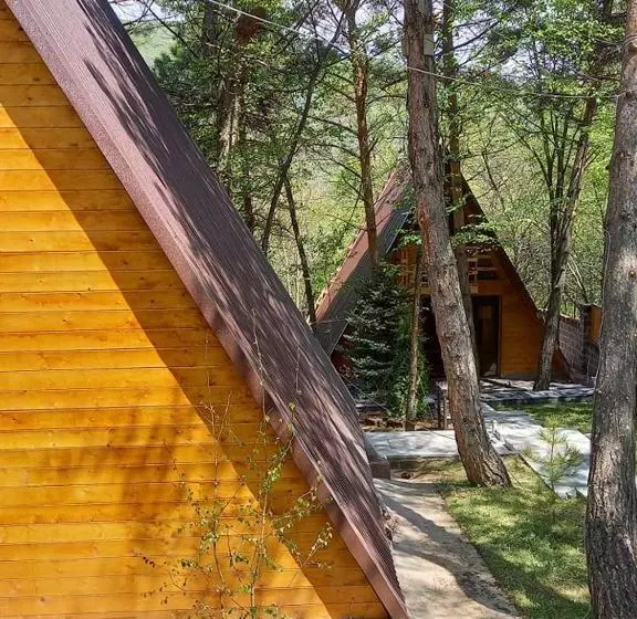 هتل Woodland Cottages