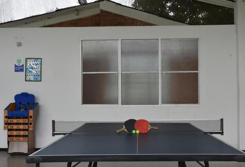 호텔 Club Bella Suiza   Carlos Ossa Escobar