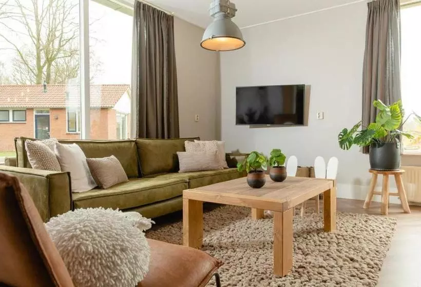 استراحتگاه 8  Person Childbungalow   Theme Farm Adapted