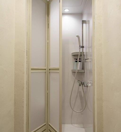 Общежитие ゲストハウス さんかくワサビ Guest House Sankaku Wasabi