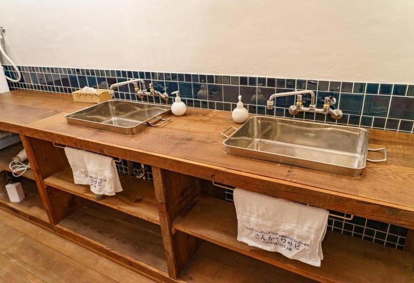 Общежитие ゲストハウス さんかくワサビ Guest House Sankaku Wasabi