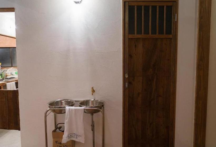 Общежитие ゲストハウス さんかくワサビ Guest House Sankaku Wasabi