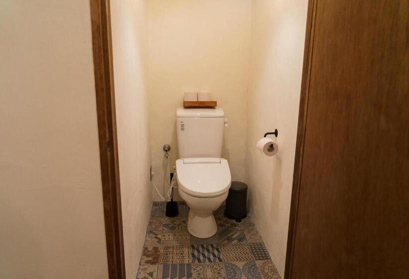 Общежитие ゲストハウス さんかくワサビ Guest House Sankaku Wasabi