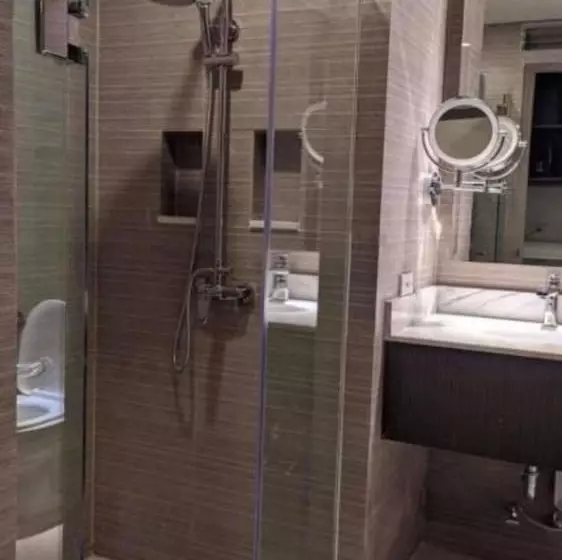 هتل Capital O 804 The Residences At Bonifacio Civic Center