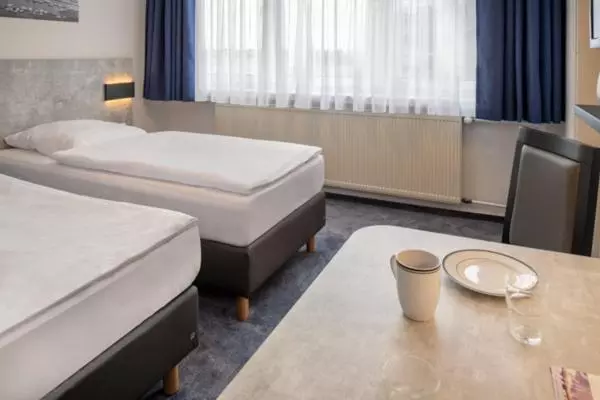 ホテル & Gästehaus Rostock Lütten Klein