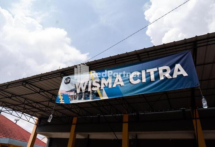 Отель Wisma Citra Metro Mitra Reddoorz