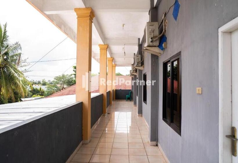 Отель Wisma Citra Metro Mitra Reddoorz