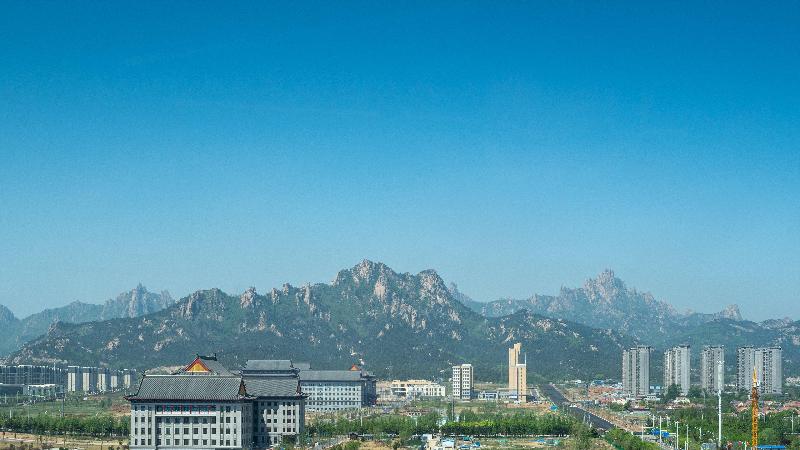 فندق Holiday Inn Express Qingdao Guzhenkou