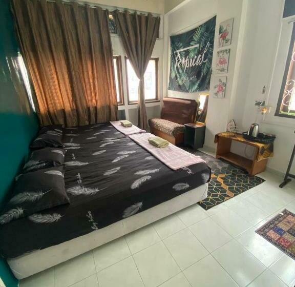 בית מלון כפרי Pesona Backpackers Inn