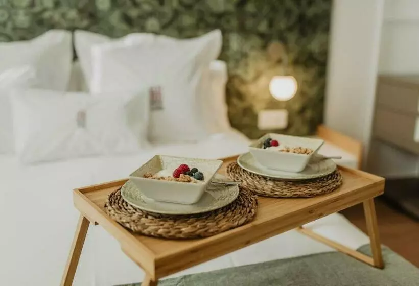تختخواب و صبحانه Petit Luxe Volta