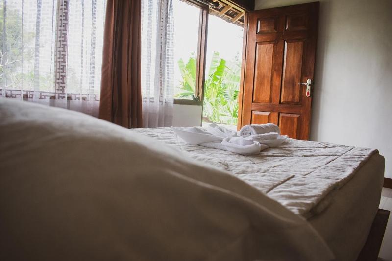 Отель Taman Dolan Home & Resort