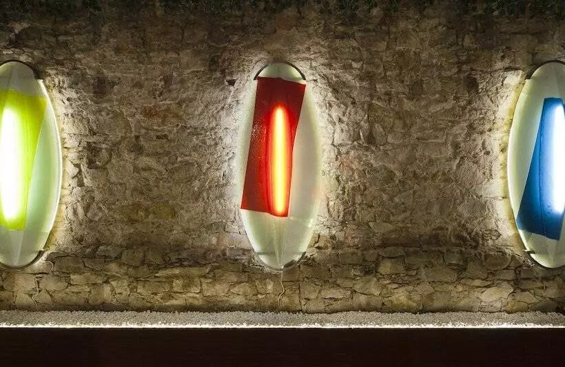 Отель Ako Suites