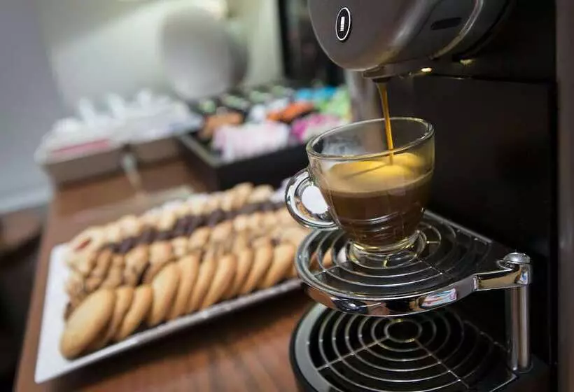 Отель Ako Suites