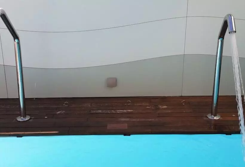 Отель Ako Suites