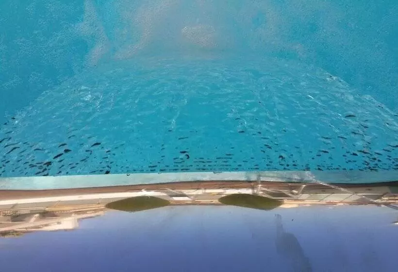 Отель Ako Suites