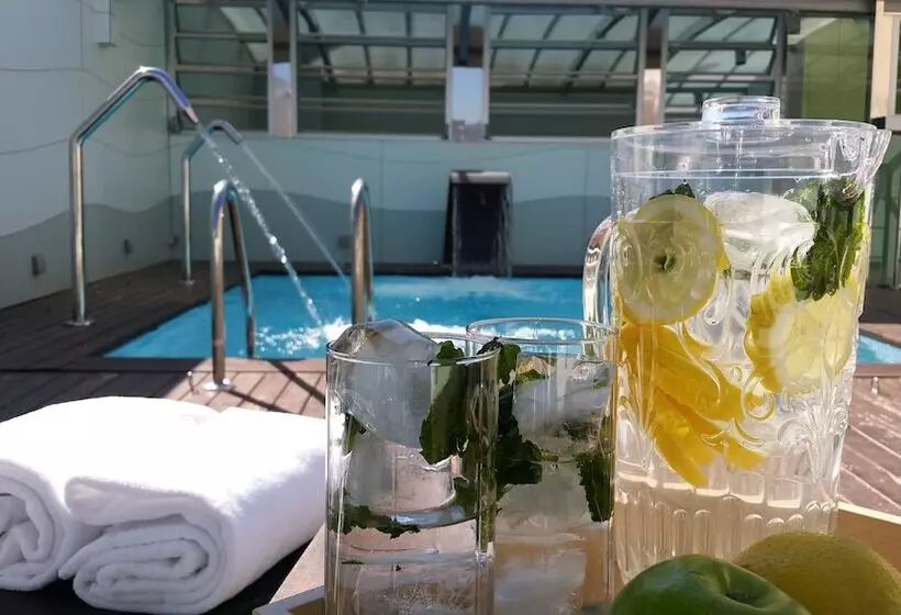 Отель Ako Suites