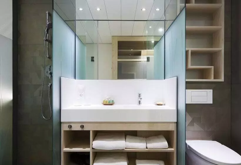 Отель Ako Suites