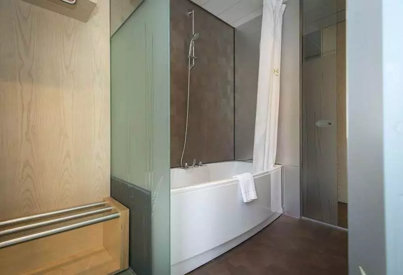 Отель Ako Suites