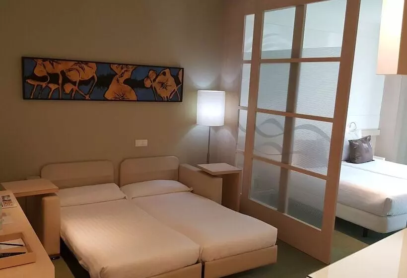 Отель Ako Suites