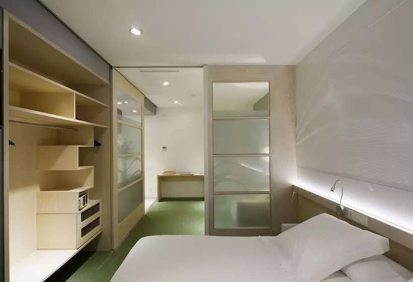 Отель Ako Suites